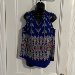 Sleeveless blue blouse